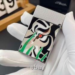 S. T. Dupont presents limited edition tiger-eye art-silver double striker lighter