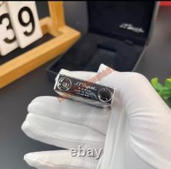 S. T. Dupont presents limited edition tiger-eye art-silver double striker lighter