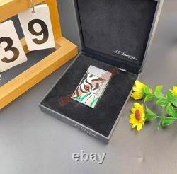 S. T. Dupont presents limited edition tiger-eye art-silver double striker lighter
