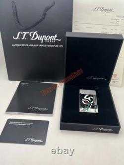 S. T. Dupont presents limited edition tiger-eye art-silver double striker lighter