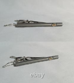 Pin's de cravate en ligne à rayures logo D Dupont argent or rare édition limitée