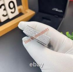 S. T. Dupont présente le briquet double frappe en argent art avec édition limitée œil de tigre