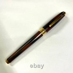 Stylo à plume ST Dupont en écaille de tortue avec finition laquée